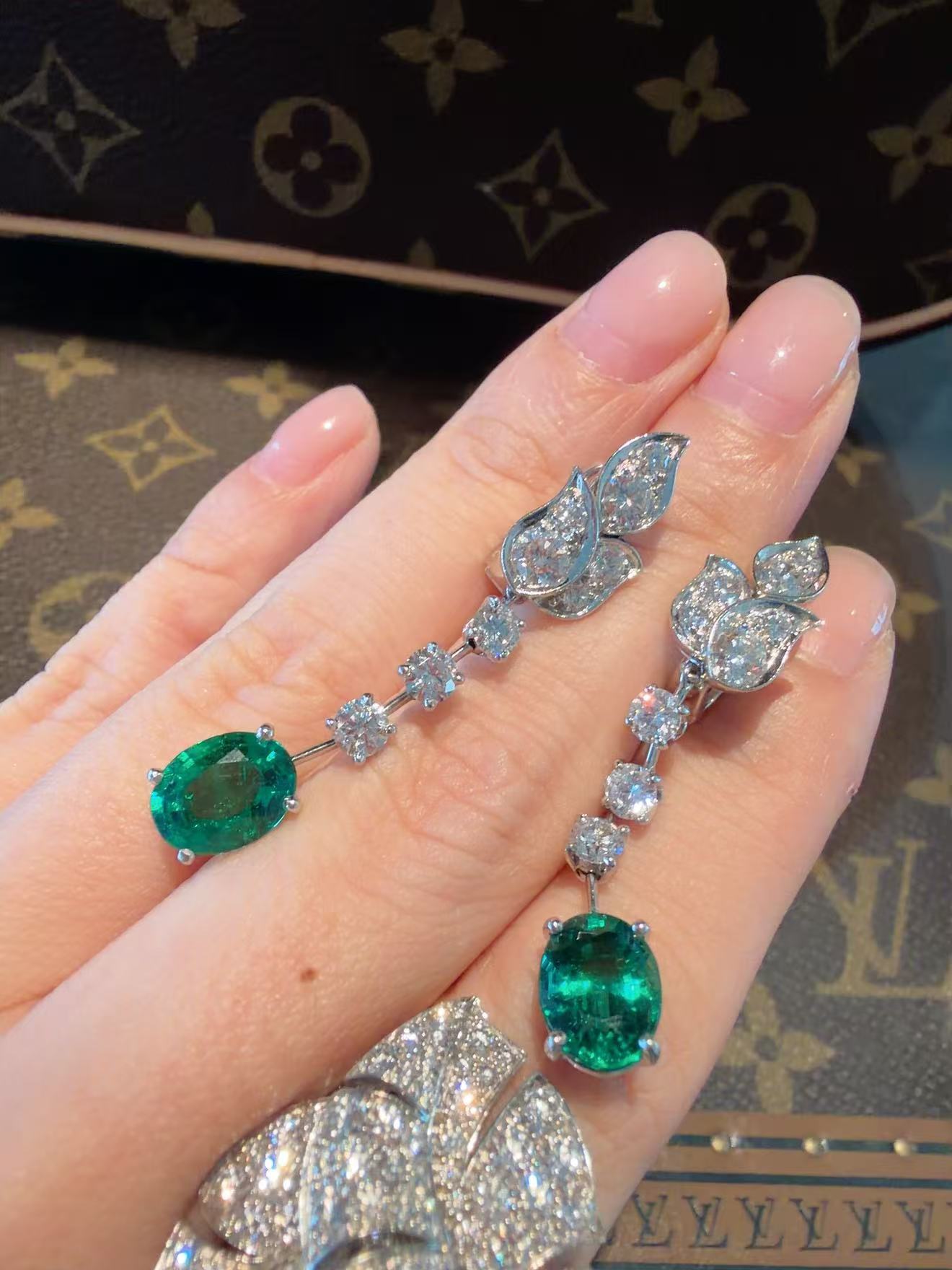Cartier High Jewelry Collection 1.8-carat emerald earrings in 18K white gold with diamonds - exquisite condition, in stock.