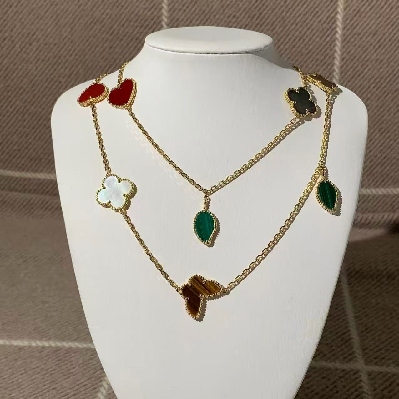 VCA (Van Cleef & Arpels) Lucky Alhambra Collection Twelve-Flower Long Necklace, 18K Gold, Tiger's Eye/Carnelian/Mother-of-Pearl/Malachite, 2025 Complete Set