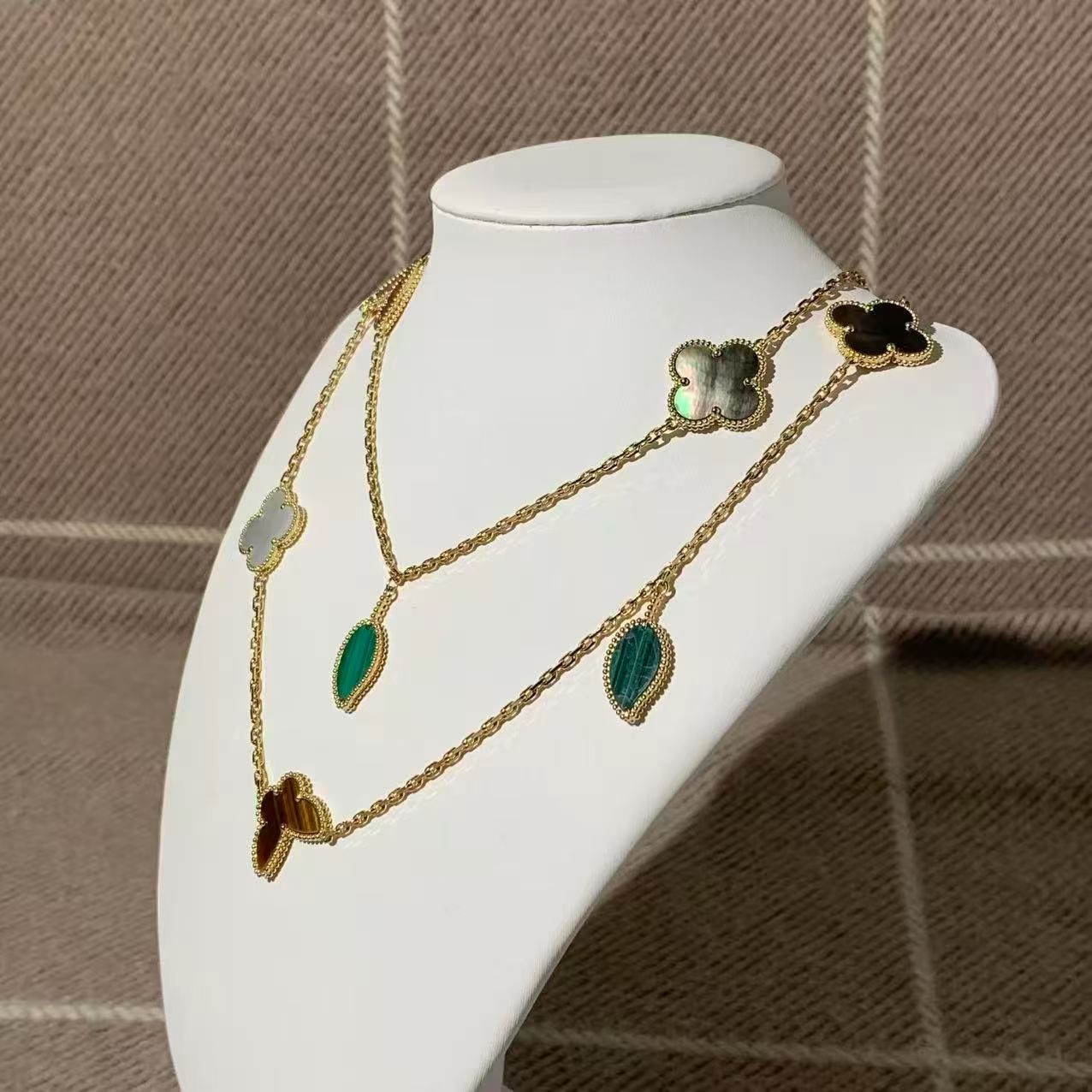 VCA (Van Cleef & Arpels) Lucky Alhambra Collection Twelve-Flower Long Necklace, 18K Gold, Tiger's Eye/Carnelian/Mother-of-Pearl/Malachite, 2025 Complete Set