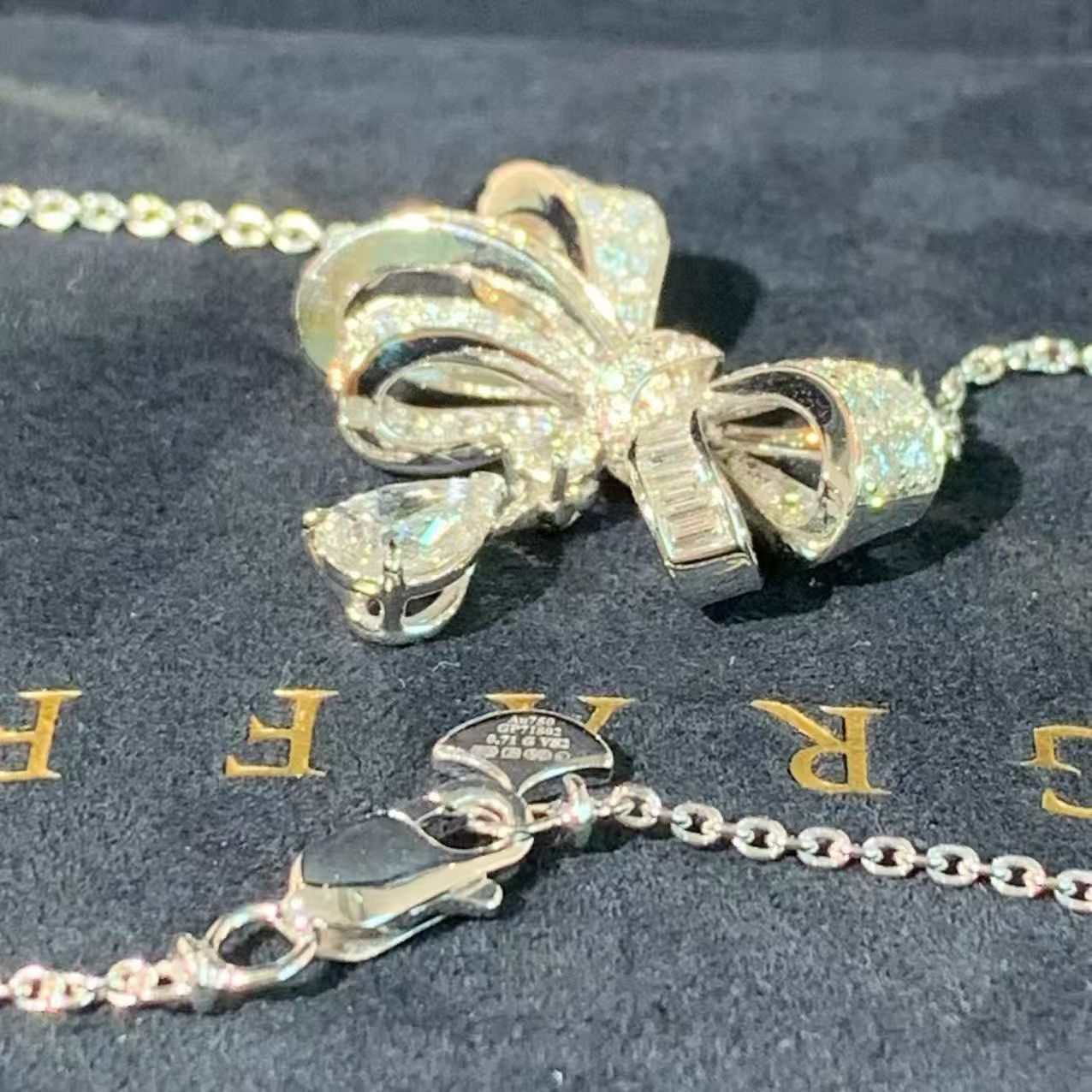 Graff Tilda's Bow Collection 18K White Gold Full Diamond Bow Necklace, 0.7-carat teardrop-shaped main diamond, 2023 complete set.