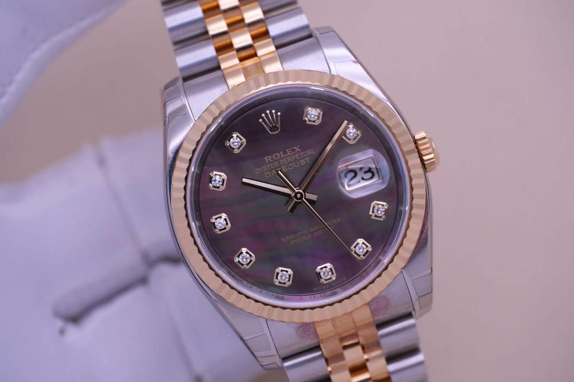 ✦ Rolex Datejust 116233 36mm 18K gold and steel dial with mother-of-pearl and diamond setting, automatic mechanical movement