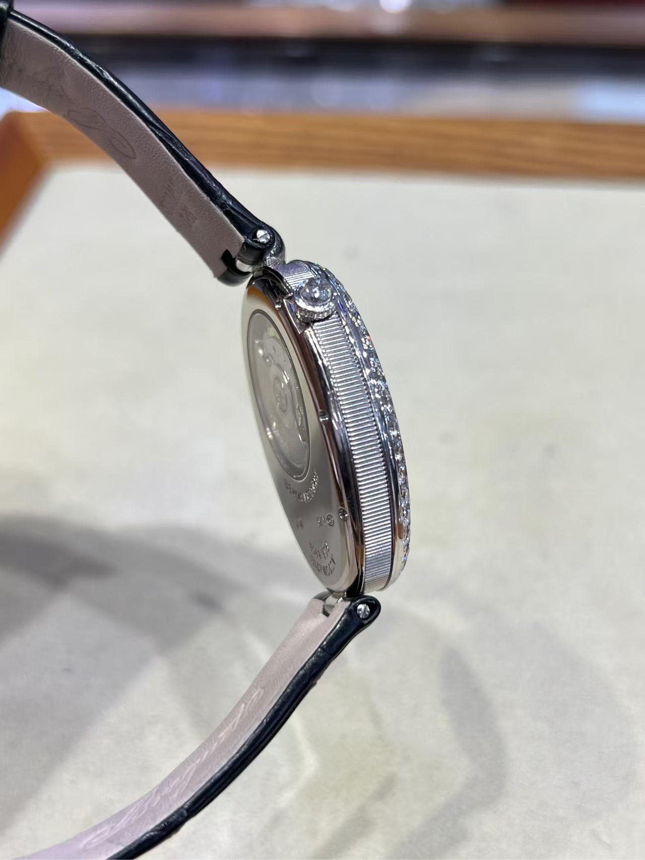 ✦ Breguet Reine de Naples 8958BB 18K white gold, diamond-set mother-of-pearl, embossed sunflower automata